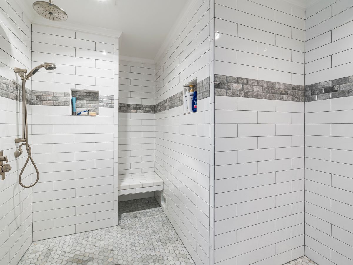 Replace shower mixer and reseal tray